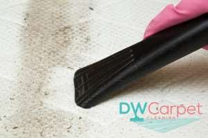 dust-dirt-being-vacuumed-from-mattress-cleaning-dw-carpet-cleaning-singapore