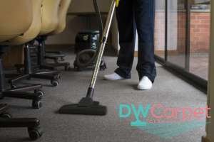 cleaner-vacuuming-the-flooring-how-to-choose-the-right-office-carpet-cleaning-service-for-your-workplace-office-carpet-cleaning-dw-carpet-cleaning-singapore