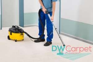 professional-cleaner-vacuuming-the-carpet-how-to-choose-the-right-office-carpet-cleaning-service-for-your-workplace-office-carpet-cleaning-dw-carpet-cleaning-singapore